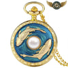 L'Océanide - Montre Pendentif Dorée Émail Bleu et Perle Nacrée - Poisson - Gousset-heritage